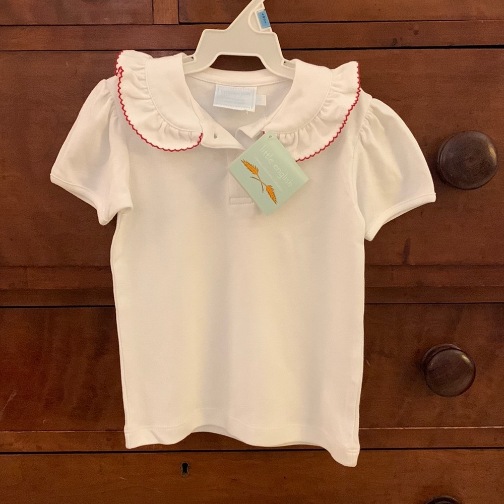 Little English cotton knit top with red piping around the collar